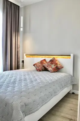 Łóżko lub łóżka w pokoju w obiekcie LUX 2 pokojowe Apartment in Warszawa z bezpłatnym podziemnym parkingem