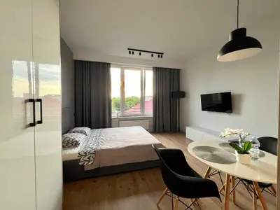 Łóżko lub łóżka w pokoju w obiekcie K22 Warszawa Zachodnia Slawinska 502
