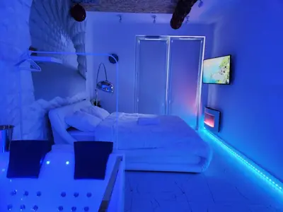 Łóżko lub łóżka w pokoju w obiekcie JACUZZI & SAUNA Apartament Warszawa Mokotów