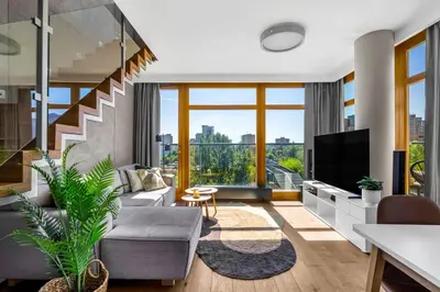 Telewizja i/lub zestaw kina domowego w obiekcie Warsaw Prestige Suites - 86m2, Two-Level Loft, Parking - by Rentujemy