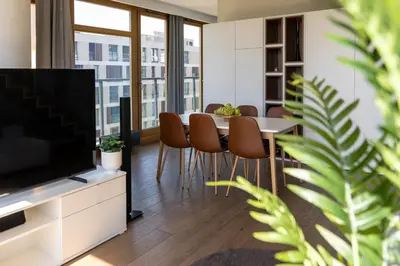 Telewizja i/lub zestaw kina domowego w obiekcie Warsaw Prestige Suites - 86m2, Two-Level Loft, Parking - by Rentujemy