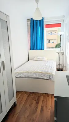 Łóżko lub łóżka w pokoju w obiekcie Ursus Rooms-Self Check-in