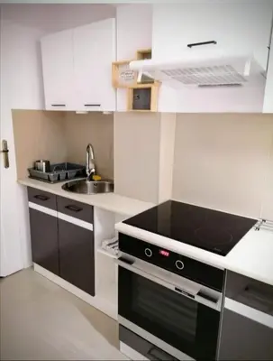 Kuchnia lub aneks kuchenny w obiekcie Ursus Rooms-Self Check-in