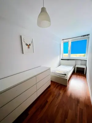Łóżko lub łóżka w pokoju w obiekcie Ursus Rooms-Self Check-in