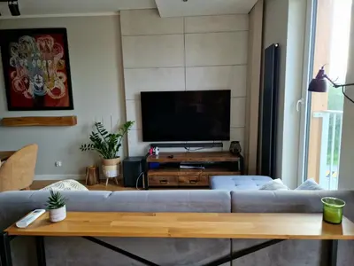 Telewizja i/lub zestaw kina domowego w obiekcie Harmony Apartment