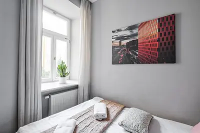 Łóżko lub łóżka w pokoju w obiekcie City Center - Cozy And Bright - Dobra 11