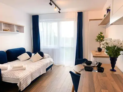 Łóżko lub łóżka w pokoju w obiekcie Healthy Life Apartment