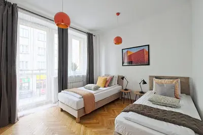Łóżko lub łóżka w pokoju w obiekcie Modern And Cozy - City Center - Dobra 27