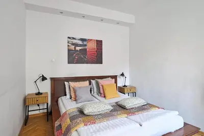Łóżko lub łóżka w pokoju w obiekcie Modern And Cozy - City Center - Dobra 27