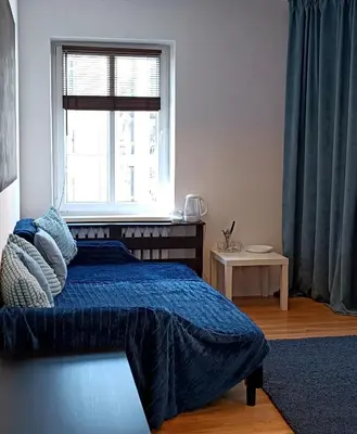 Łóżko lub łóżka w pokoju w obiekcie Duży prywatny pokój blisko Starego Miasta. Pokój 7