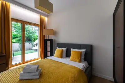Łóżko lub łóżka w pokoju w obiekcie Urban Chic - Luxury 2-Bedroom, Mennica Residence