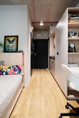 Łóżko lub łóżka w pokoju w obiekcie Chillout Dorm Warszawa by BookingHost