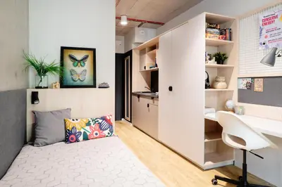 Łóżko lub łóżka w pokoju w obiekcie Chillout Dorm Warszawa by BookingHost