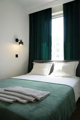 Łóżko lub łóżka w pokoju w obiekcie Mieszkanie Warszawa 6