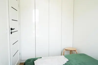Łóżko lub łóżka w pokoju w obiekcie Mieszkanie Warszawa 6