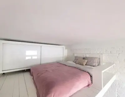 Łóżko lub łóżka w pokoju w obiekcie Warsaw Concierge Radna