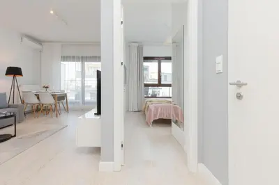 Część wypoczynkowa w obiekcie Sarmacka Apartment with Balcony Warsaw Wilanów by Noclegi Renters