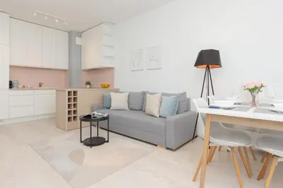 Część wypoczynkowa w obiekcie Sarmacka Apartment with Balcony Warsaw Wilanów by Noclegi Renters