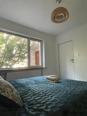 Łóżko lub łóżka w pokoju w obiekcie Wilanów Villa – Resorowa 28