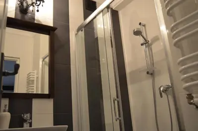 Łazienka w obiekcie Apartament Orchidea Centrum