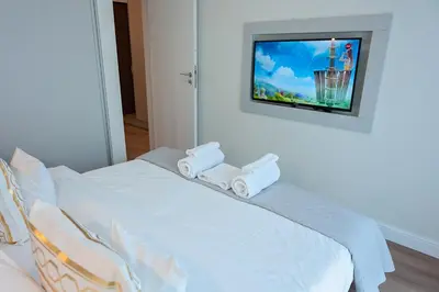 Łóżko lub łóżka w pokoju w obiekcie Mennica Residence - Grzybowska 43A