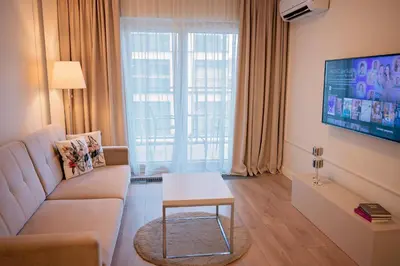 Telewizja i/lub zestaw kina domowego w obiekcie Mennica Residence - Grzybowska 43A