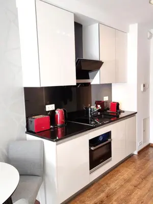 Kuchnia lub aneks kuchenny w obiekcie Słoneczny Apartament Warsaw Spire