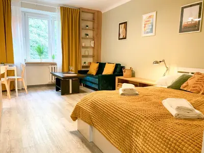 Łóżko lub łóżka w pokoju w obiekcie Good Days Apartment