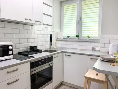 Kuchnia lub aneks kuchenny w obiekcie Good Days Apartment