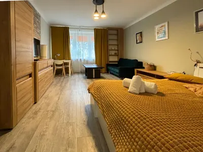 Łóżko lub łóżka w pokoju w obiekcie Good Days Apartment