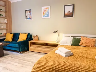 Łóżko lub łóżka w pokoju w obiekcie Good Days Apartment