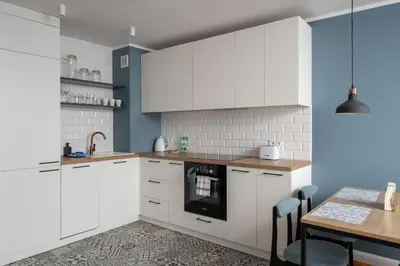 Kuchnia lub aneks kuchenny w obiekcie Bielany Comfort Apartment by BookingHost