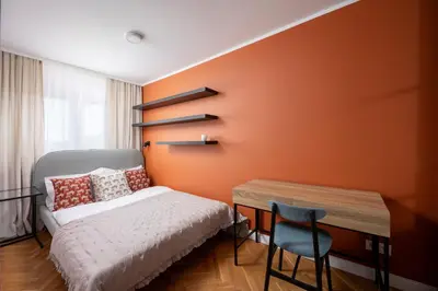 Łóżko lub łóżka w pokoju w obiekcie Bielany Comfort Apartment by BookingHost