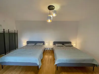 Łóżko lub łóżka w pokoju w obiekcie Apartament przy Atrium okolice stacji metra Rondo ONZ