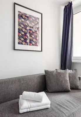 Część wypoczynkowa w obiekcie Wola Comfort Studio #1 by BookingHost