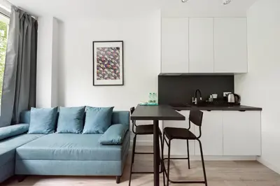 Część wypoczynkowa w obiekcie Wola Comfort Studio #2 by BookingHost