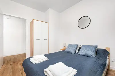 Łóżko lub łóżka w pokoju w obiekcie Wynalazek 3 by Homeprime