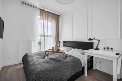 Telewizja i/lub zestaw kina domowego w obiekcie Rondo Daszyńskiego Apartments N1 - Parking, 8th Floor, City View, Subway - by RENTUJEMY