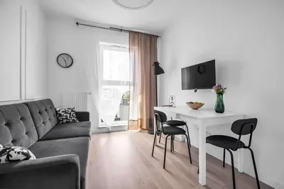 Telewizja i/lub zestaw kina domowego w obiekcie Rondo Daszyńskiego Apartments N1 - Parking, 8th Floor, City View, Subway - by RENTUJEMY