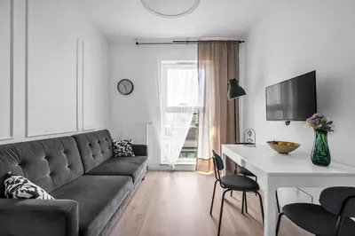 Część wypoczynkowa w obiekcie Rondo Daszyńskiego Apartments N1 - Parking, 8th Floor, City View, Subway - by RENTUJEMY