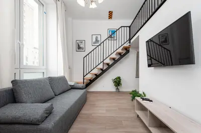 Telewizja i/lub zestaw kina domowego w obiekcie Świętokrzyska 16 (E-G) by Homeprime