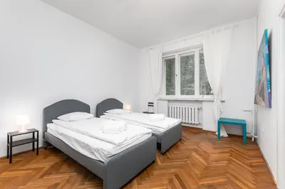 Łóżko lub łóżka w pokoju w obiekcie Marszałkowska 18 by Homeprime