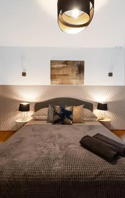 Łóżko lub łóżka w pokoju w obiekcie ClickTheFlat Bellottiego Apart Rooms