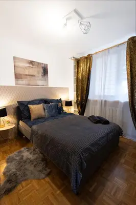 Łóżko lub łóżka w pokoju w obiekcie ClickTheFlat Bellottiego Apart Rooms