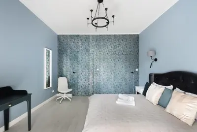 Łóżko lub łóżka w pokoju w obiekcie Wiejska Glamour Apartment by BookingHost
