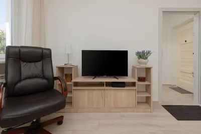 Telewizja i/lub zestaw kina domowego w obiekcie Racławicka Cozy Studio Apartment by Noclegi Renters
