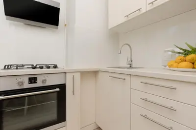 Kuchnia lub aneks kuchenny w obiekcie Racławicka Cozy Studio Apartment by Noclegi Renters