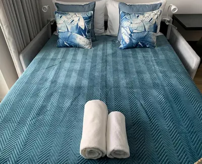 Łóżko lub łóżka w pokoju w obiekcie Warsaw Home Suites