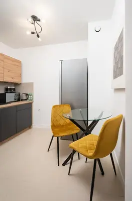 Kuchnia lub aneks kuchenny w obiekcie Browary Warszawskie Modern Studio by BookingHost