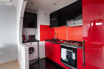 Kuchnia lub aneks kuchenny w obiekcie Krochmalna Red Apartment by BookingHost